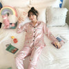 Image of 2019 Autumn Women's Pajamas Sets with Flower Print Fashion Luxury Female Faux Silk Two Pieces Shirts + Pants Nighties Sleepwear
