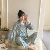 Image of 2019 Autumn Women's Pajamas Sets with Flower Print Fashion Luxury Female Faux Silk Two Pieces Shirts + Pants Nighties Sleepwear